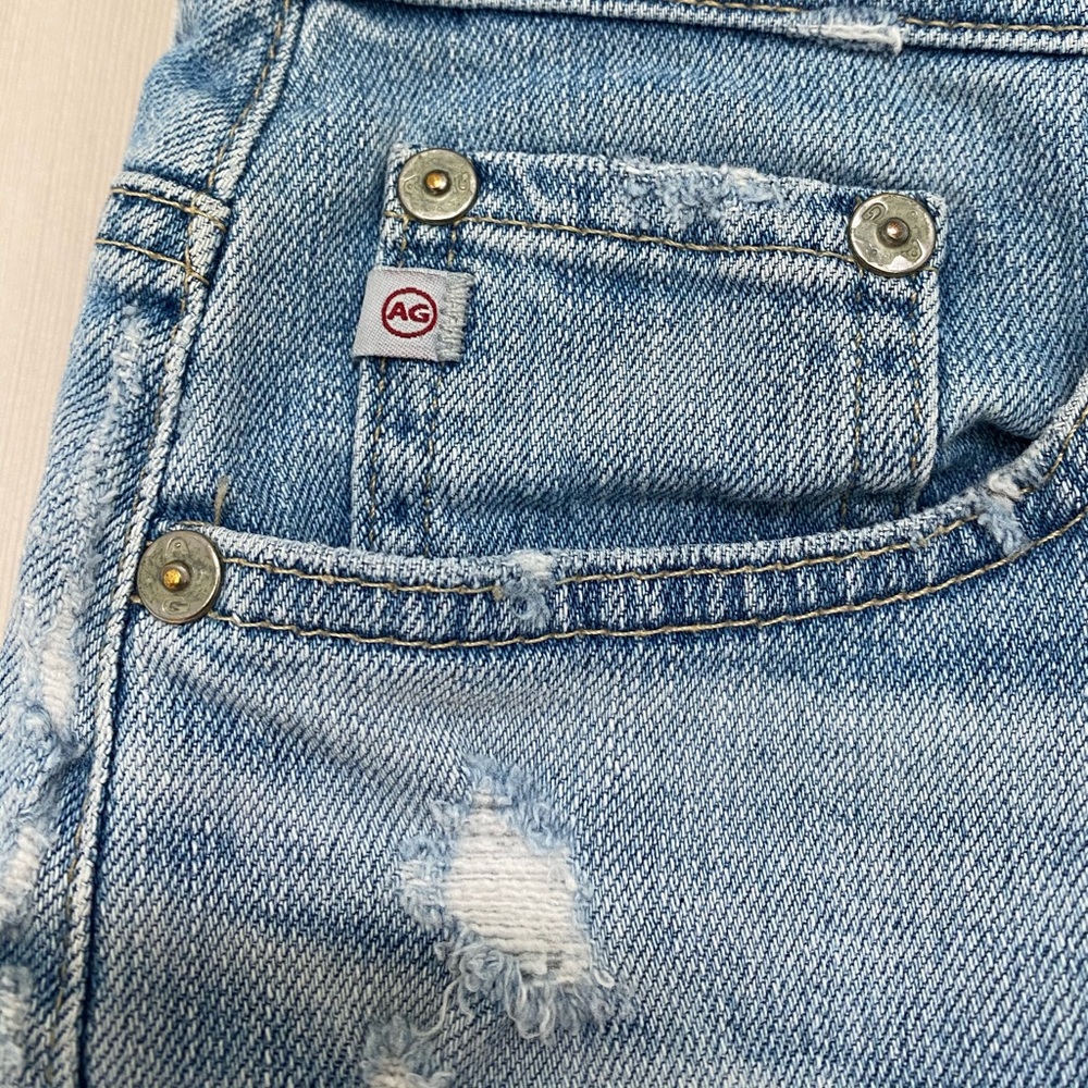 AG light-wash distressed denim pencil skirt